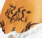 Angelina Jolie tattoo lower back before covering