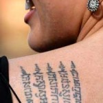 Angelina Jolie Khmer tattoo detail