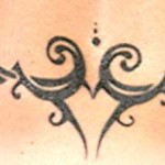Tattoo tribal bas du dos