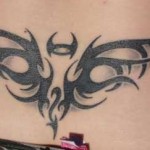 Tattoo tribal bas du dos