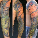 Tatouage bras Guy Aitchinson