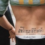 tatouage-bas-dosrobbie-williams Tatouage Bas du dos Robbie Williams