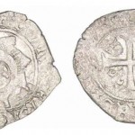 Monnaie ancienne avec dauphin et croix celtique