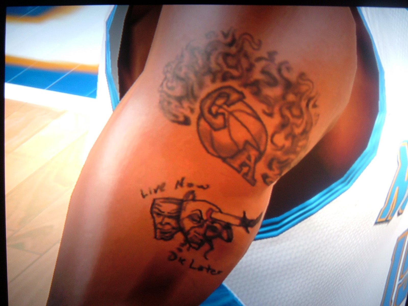 Tatouage ballon basket Carmelo Anthony