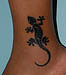 Modèle de tatouage lézard sur la cheville